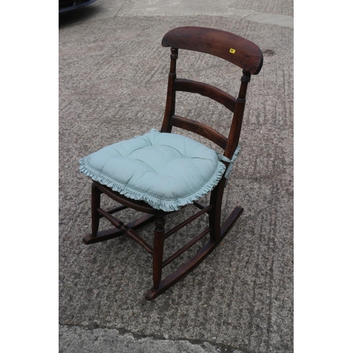 547 - A pair of Edwardian walnut spindle back side chairs, a similar low seat chair and a rocking chair