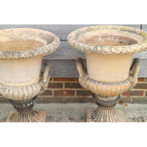 590 - A pair of terracotta campana garden urns, by A M Blashfield, both with stamped marks dated 1868, 24