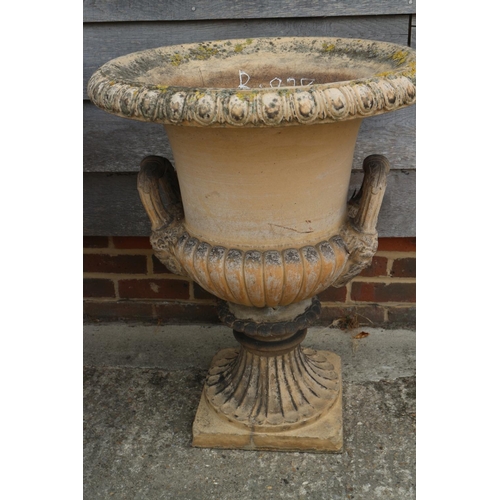 590 - A pair of terracotta campana garden urns, by A M Blashfield, both with stamped marks dated 1868, 24