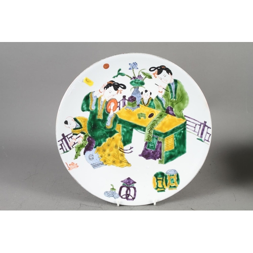 75 - A Chinese shaped rim bowl, decorated with flowers and fruit on a yellow ground with seal mark to bas... 