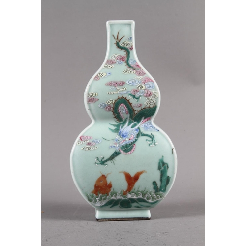 77 - A Chinese celadon glazed double gourd vase, 9