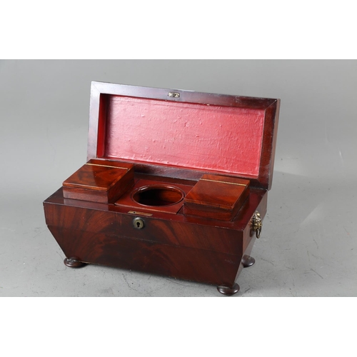 142 - A 19th century mahogany sarcophagus tea caddy, on turned supports, 13