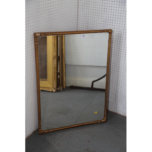 476 - A pair of wall mirrors, in gilt frames carved scrolls, 28