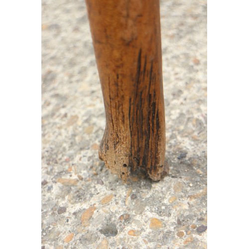 543 - An 18th century oval fruitwood dining table, on pole turned supports and pad feet, 41