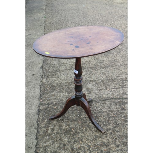 456 - A 19th century mahogany oval top occasional table, on turned column and tripod splay support, 23