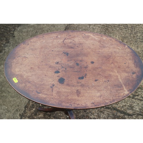 456 - A 19th century mahogany oval top occasional table, on turned column and tripod splay support, 23