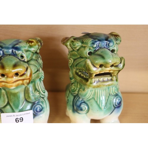 69 - A pair of green glazed Dogs of Fo, 6