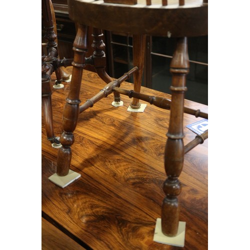 490 - A pair of fruitwood splat and spindle back side chairs with panel seats, on turned and stretchered s... 