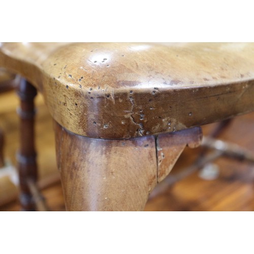 490 - A pair of fruitwood splat and spindle back side chairs with panel seats, on turned and stretchered s... 