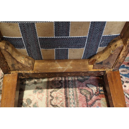 409 - A set of four early 19th century fruitwood dining chairs with swag carved vertical rail backs and st... 