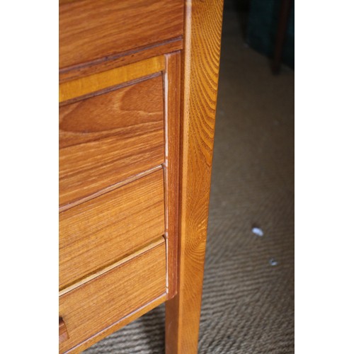 567 - A 1960s teak double pedestal desk, fitted one deep and three shallow drawers, on stile supports, 59