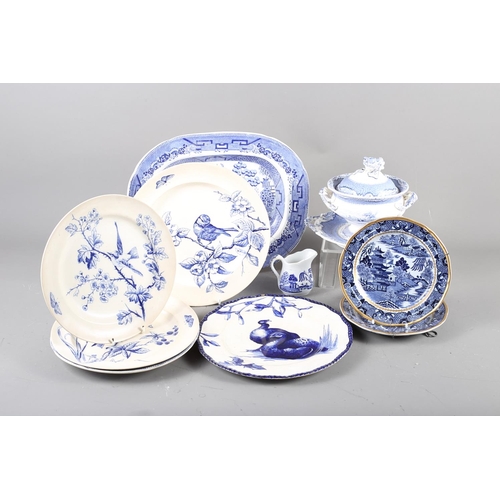 54 - A 19th century blue and white sauce tureen and cover, a ladle and stand, two Davenport 