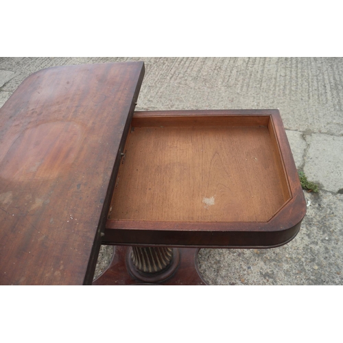 396 - A 19th century mahogany fold-over top card table, on quadruple splay support, 36