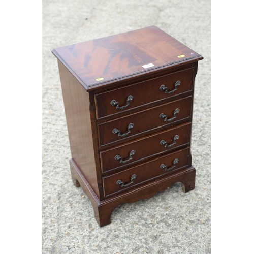 546 - An Edwardian mahogany and inlaid folding Sutherland table, on turned and square supports, 31