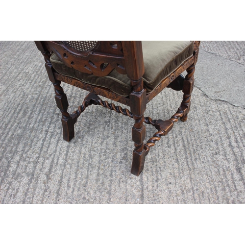 373 - A 19th century carved rosewood showframe armchair, upholstered in a cream brocade, on cabriole suppo... 