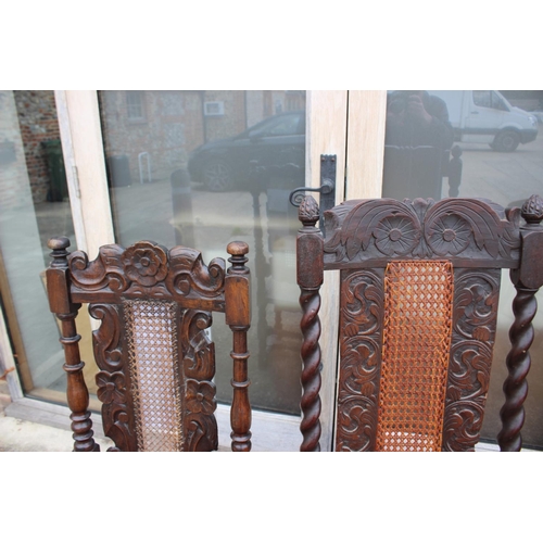 377 - A James II style carved oak side chair with caned back panel and seat, on turned and stretchered sup... 