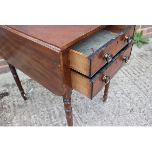 381 - A mahogany drop leaf table, fitted two drawers, on turned supports, 20