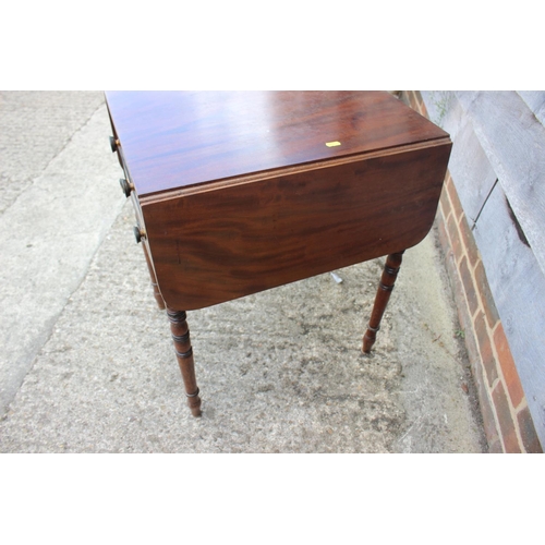 381 - A mahogany drop leaf table, fitted two drawers, on turned supports, 20