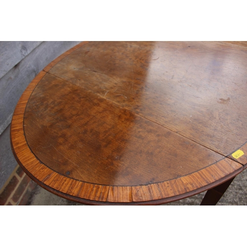 385 - An 18th century mahogany and satinwood banded oval Pembroke table, on square taper castored supports... 