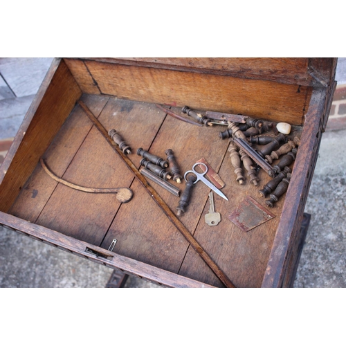 386 - A 19th century carved oak and blind fretwork desk, fitted tooled lined top, on panel end supports, 2... 