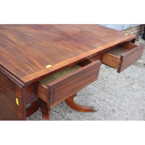 388 - An early 19th century mahogany and satinwood banded sofa table, fitted two frieze drawers, on square... 