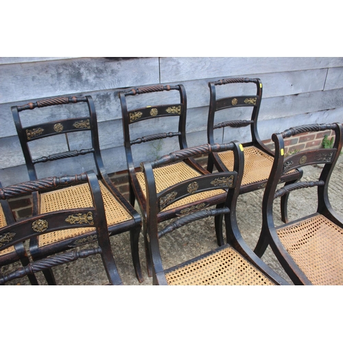 393 - A set of twelve Regency ebonised and brass rope mounted rope twist bar back dining chairs with cane ... 