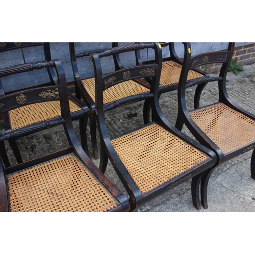 393 - A set of twelve Regency ebonised and brass rope mounted rope twist bar back dining chairs with cane ... 