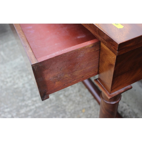 408 - A Biedermeier figured mahogany dressing table with arch top mirror, over single drawer, on turned su... 