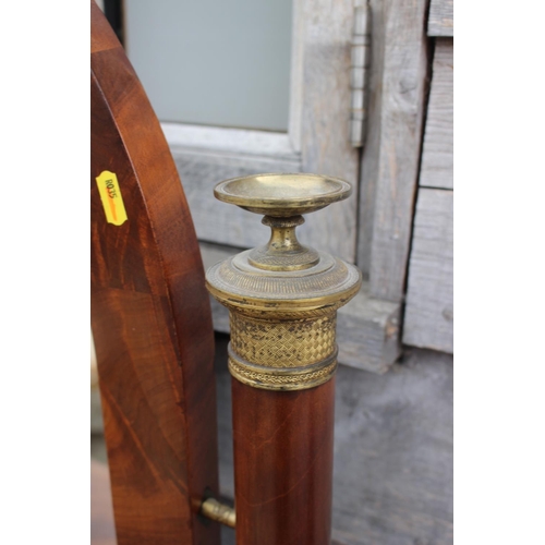 408 - A Biedermeier figured mahogany dressing table with arch top mirror, over single drawer, on turned su... 