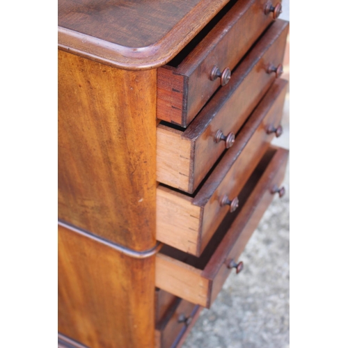 423 - A collector's Victorian mahogany chest of six long graduated drawers, on turned supports, 13 1/2