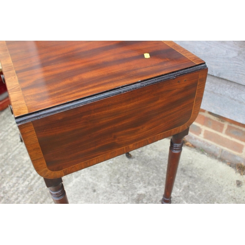 430 - A 19th century mahogany and banded flap top writing table, fitted two drawers, on turned and castore... 