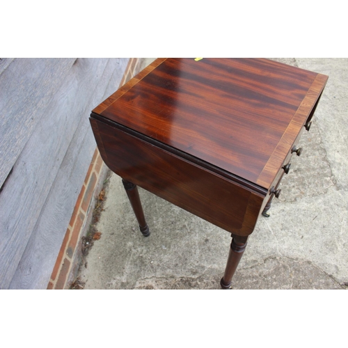 430 - A 19th century mahogany and banded flap top writing table, fitted two drawers, on turned and castore... 