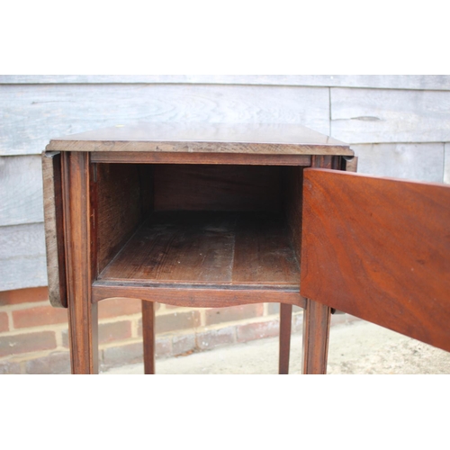 432 - A 19th century mahogany flap top bedside table, fitted cupboard, on moulded castored supports, 33