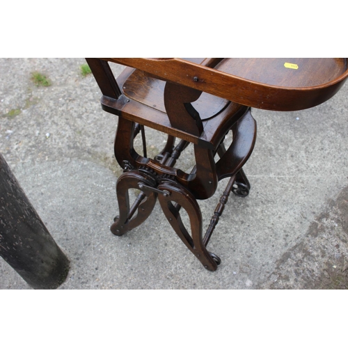 483 - A child's early 20th century oak metamorphic high chair, by T Briggs & Sons