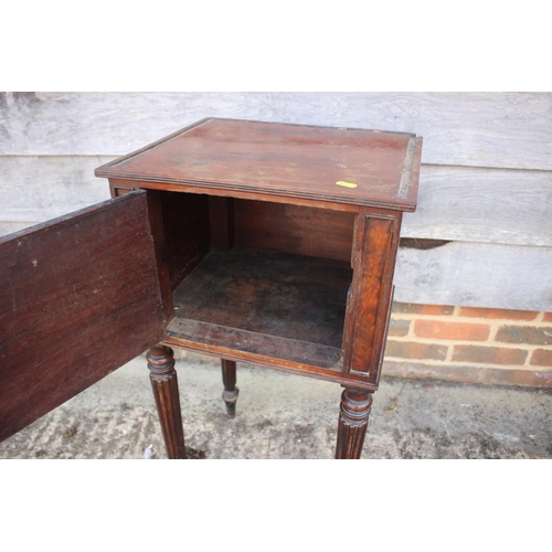 504 - A mahogany pot cupboard enclosed one door on turned supports and a side chair