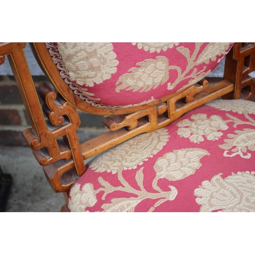 539 - An early 20th century fruitwood showframe low seat chair, in the Chinese taste, on shaped supports