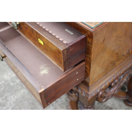 541 - A 1930s burr walnut table canteen, fitted four short drawers, on cabriole supports united by an unde... 