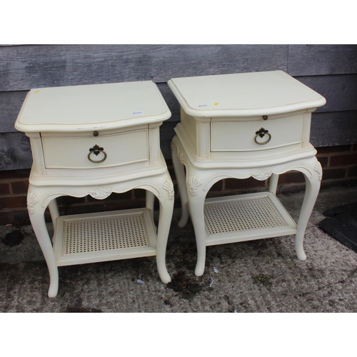 557 - A white painted French style dressing chest of three long drawers, free standing toilet mirror on sh... 