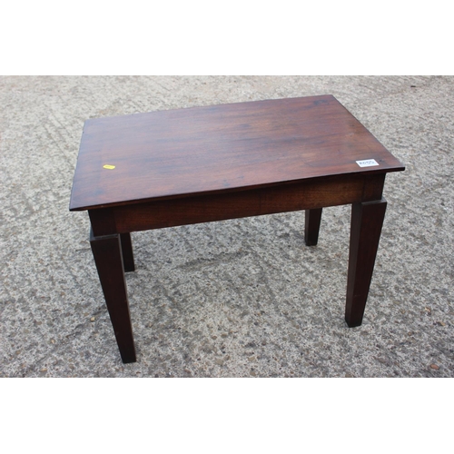 563 - A nest of three occasional tables with tooled leather tops, 20