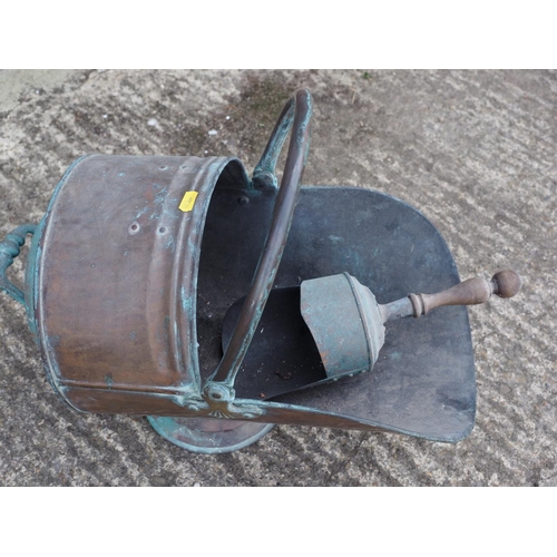 123 - A copper coal helmet, a copper and brass log pail with lion paw feet, an Edwardian fender curb and a... 