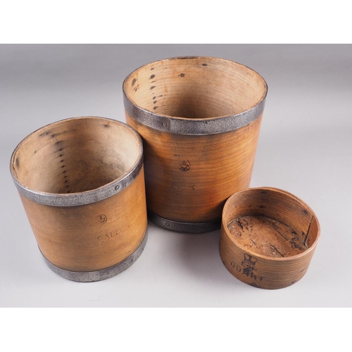 133 - A set of three 20th century grain measures, quart, gallon and peck