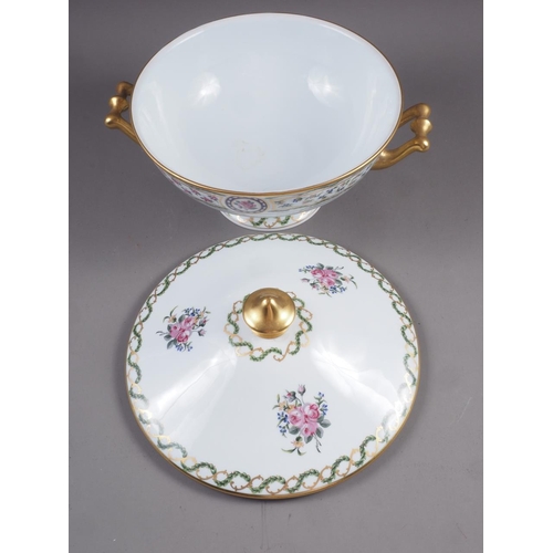 14 - A Limoges Haviland pattern tureen and cover, decorated floral sprays and swag borders, 8 1/2