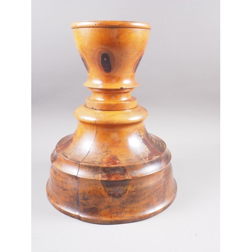 140 - A Brazilian turned hardwood bowl, on circular foot, 11 1/2