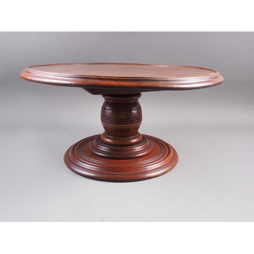 141 - A 19th century mahogany lazy Susan, 18 3/4