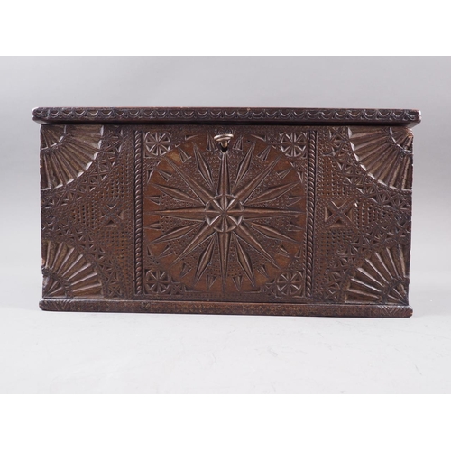 143 - An 18th century carved oak marriage box, inscribed 