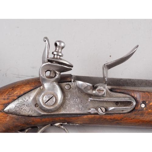 156 - An early 19th century flintlock pocket pistol with beech stock, barrel 4