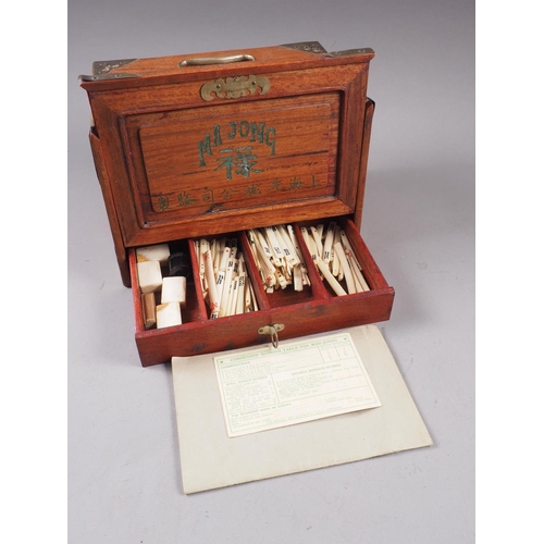 164 - A bone Mah-jongg set, in hardwood and brass mounted box, and a set of Mah-jongg wings