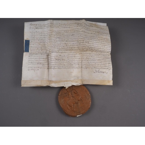 182 - A handwritten legal document on vellum with great wax state seal, dated 1747, in metal case