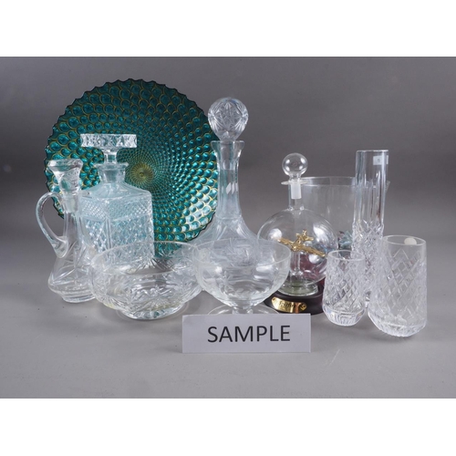 20 - A pair of ship's decanters, a cut glass claret jug and other cut glass bowls, sundaes, etc