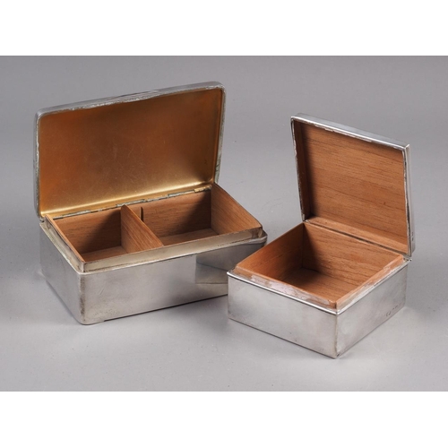 238 - A silver two-section cigarette box and another smaller cigarette box